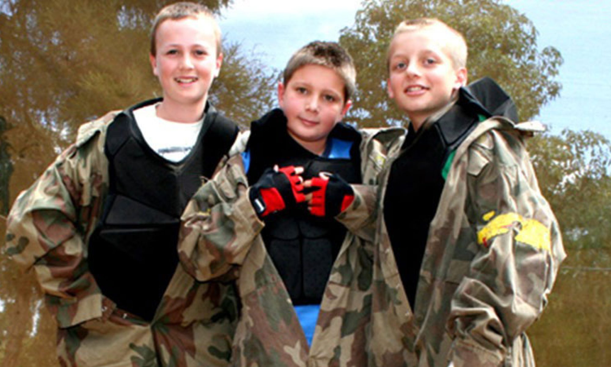 Junior paintball players ready for a game